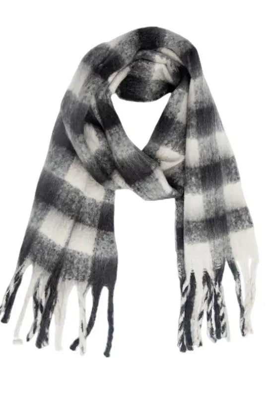 Striped gray and white wool scarf with fringed ends, ideal for stylish layering