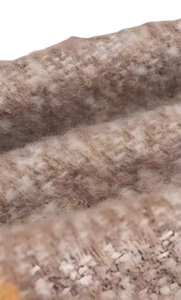 Textured beige woolen fabric with weave, showcasing Woven Wool Stitching Scarf in Rose Plaid Navy