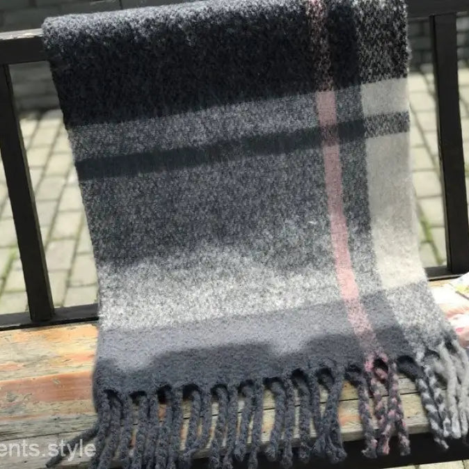 Plaid Wool Stitching Scarf in Rose Plaid Navy Blue Print draped over a railing