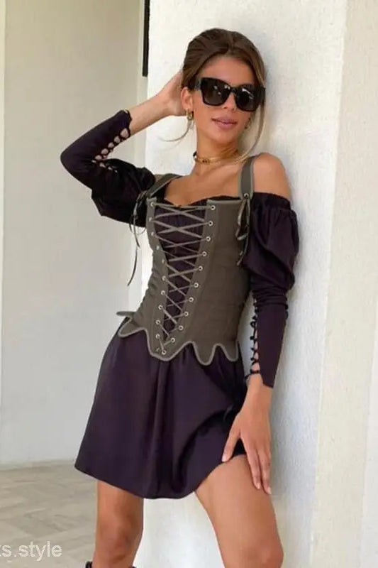 Woman wearing army green cowgirl boning corset with waist slim fit and black off-the-shoulder top