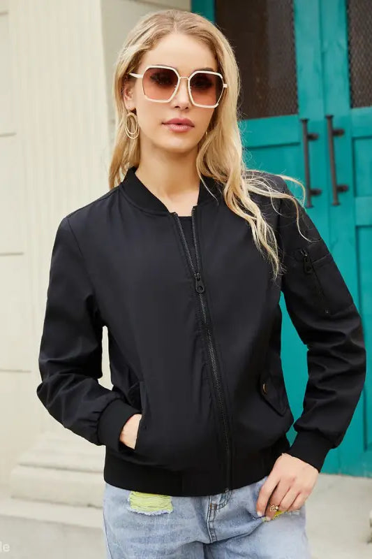 Blonde woman in sunglasses wearing an Army Green Casual Varsity Jacket with pockets