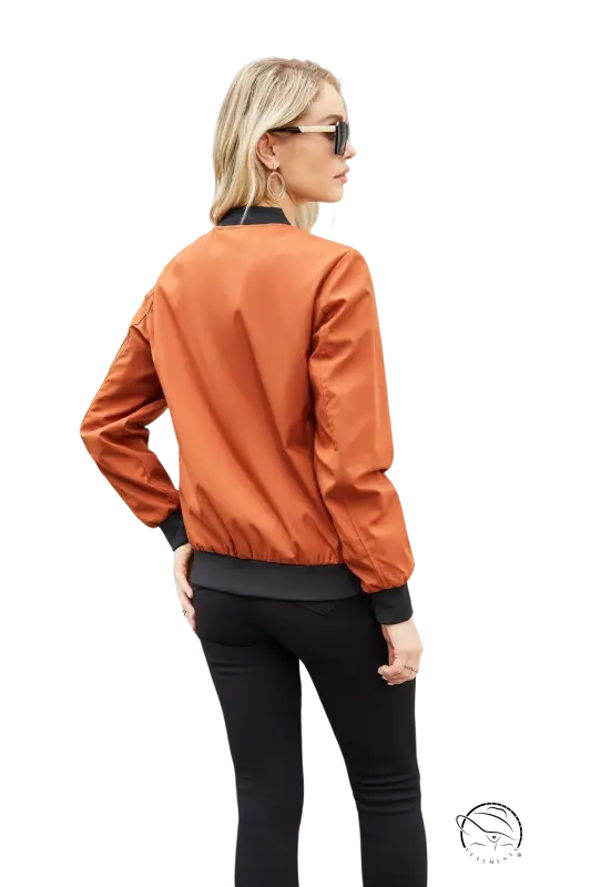 Army green casual varsity jacket on blonde woman with sunglasses