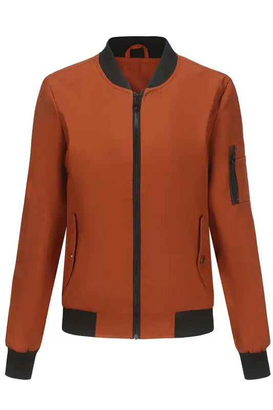 Rust-colored bomber jacket with black trim, featuring zipper closure, showcasing casual varsity style