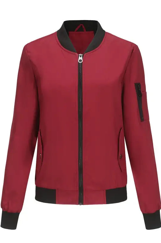 Red bomber jacket with black trim and zipper, ideal for a casual varsity jacket style