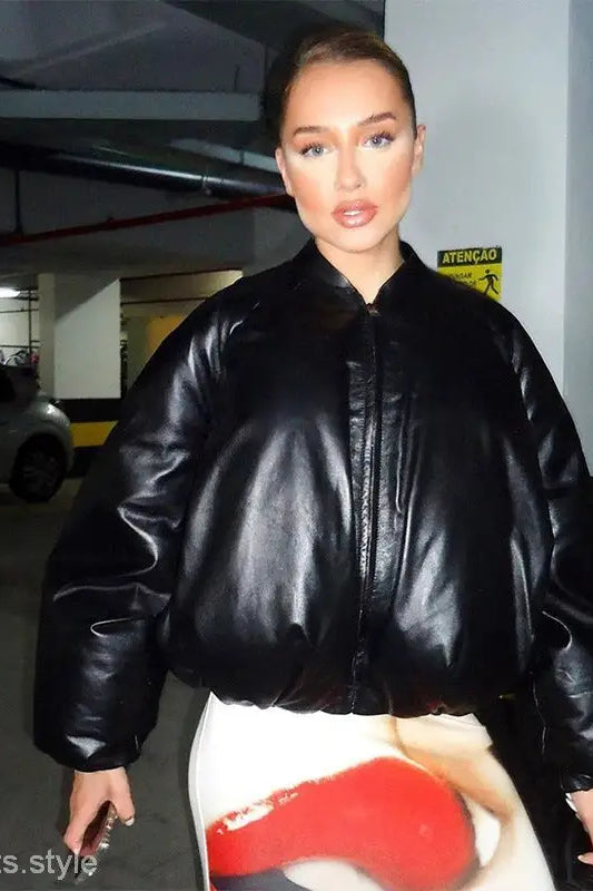 Woman wearing an oversized army green cotton cozy jacket with zipper and pockets