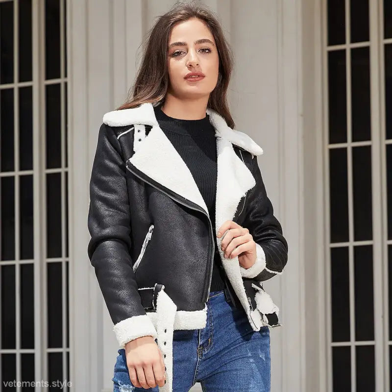 Gorgeous leather jacket with black faux leather and white faux fur trim