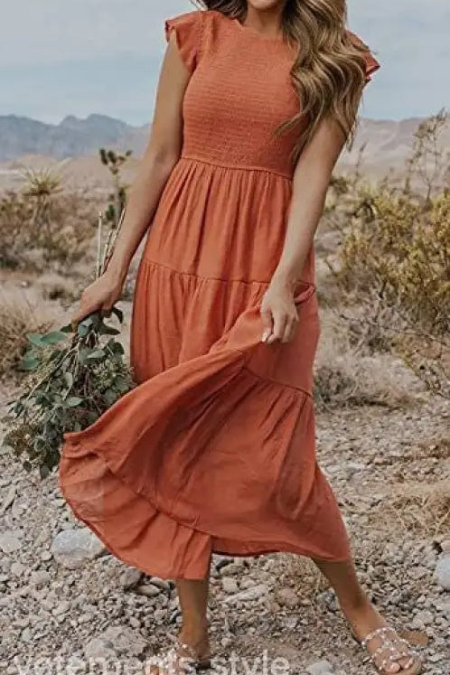 Rust-colored flounced large swing dress with cutout details suitable for Army Green style