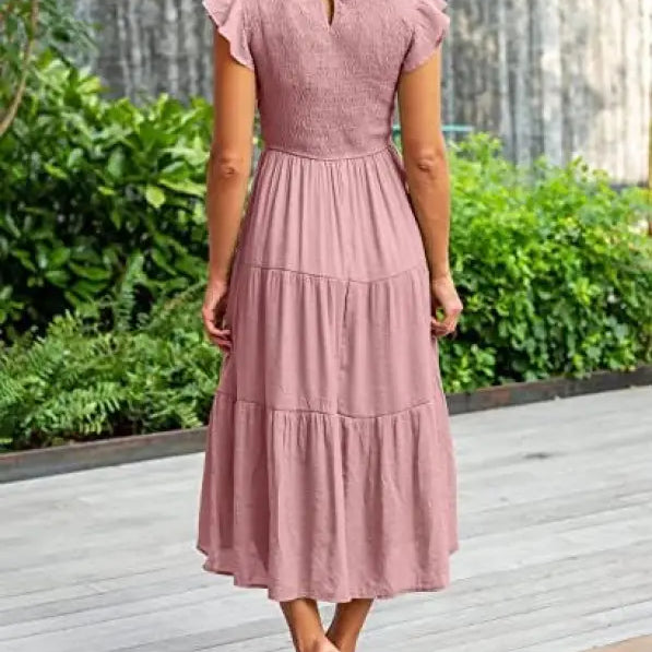 Pink tiered midi dress featuring flounced large swing design and cutout details