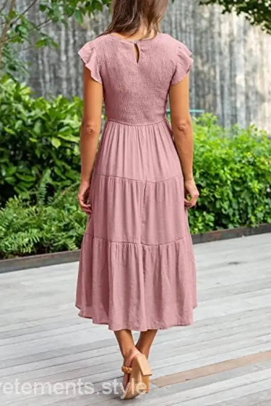 Pink tiered midi dress featuring flounced large swing design and cutout details