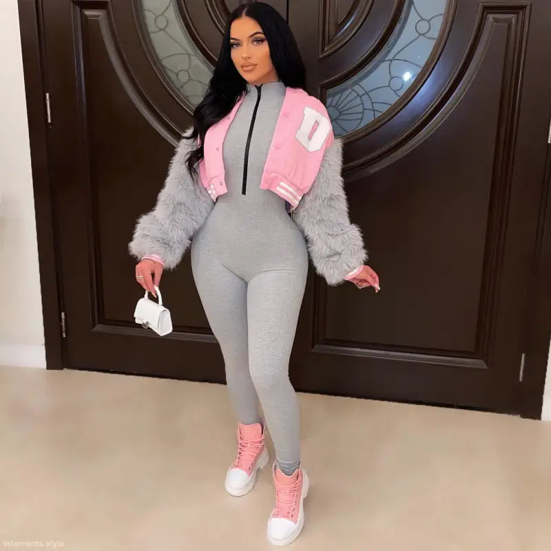 Army green gray short varsity jacket with pink fur, white zipper, and d embroidery