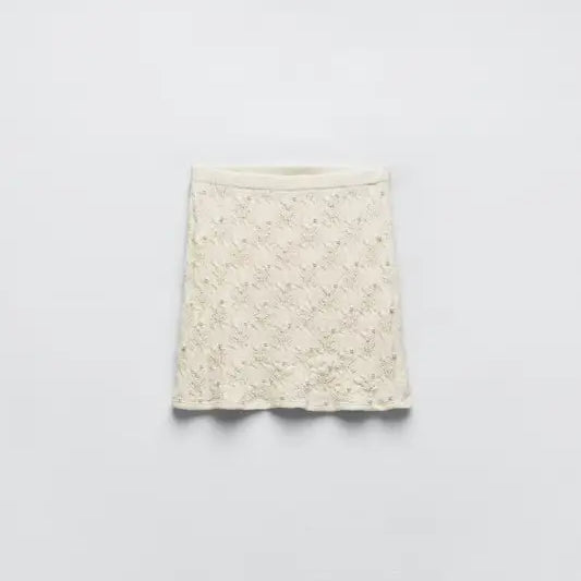 Beige lace mini skirt from Artificial Pearl Knitted Set, perfect for summer fashion