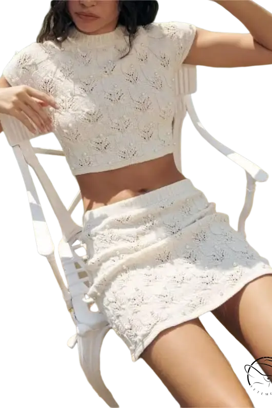 Artificial pearl knitted set featuring a white crocheted crop top and skirt for summer