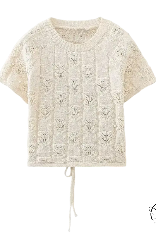 Cream-colored pearl knitted set featuring a casual crop top for summer style