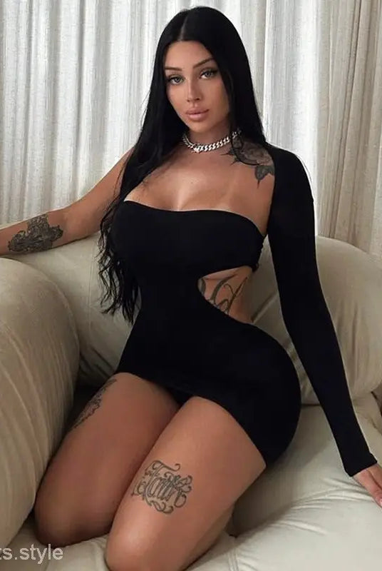 Black one-sleeve romper from Vetements Party Dress featuring a stylish cutout design