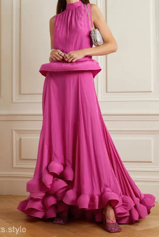 Vibrant fuchsia evening gown featuring asymmetric patchwork ruffled details for elegance
