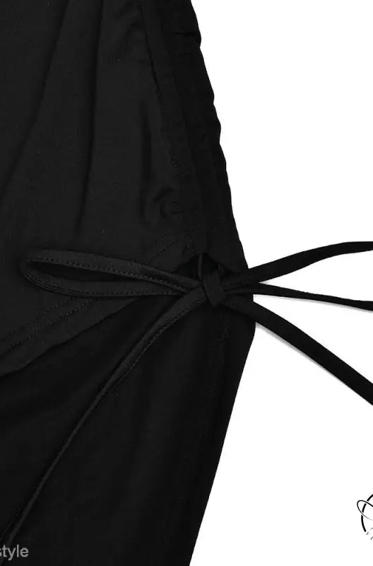 Single shoulder cami dress with black fabric and tied drawstring