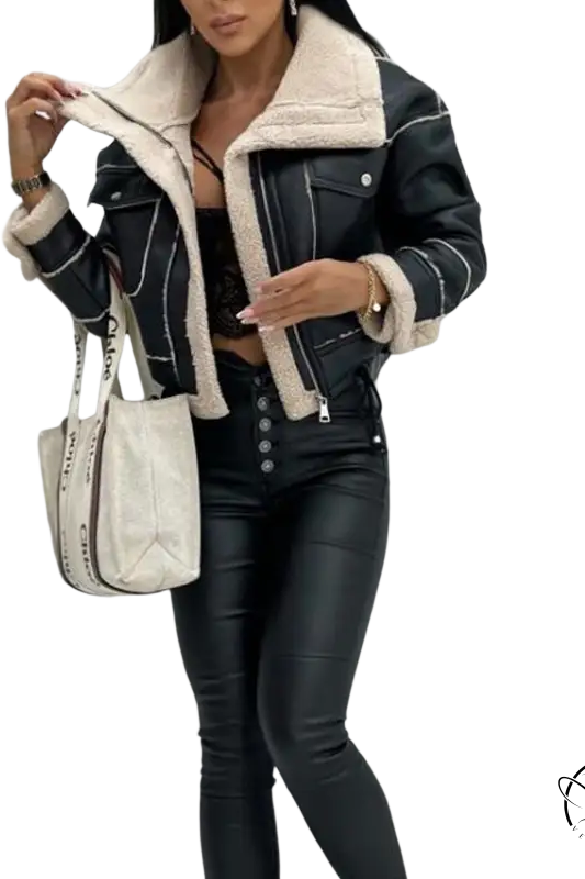 Woman in black leather faux shearling jacket and matching pants for fall and winter
