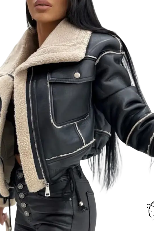 Attractive faux shearling jacket in black faux leather with fur trim