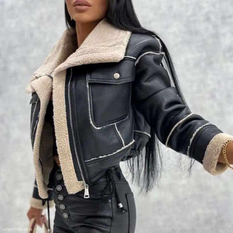 Attractive Faux Shearling Jacket featuring a black faux leather design and faux fur trim