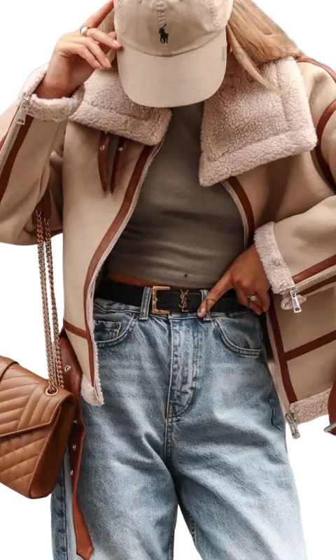 Stylish collar lamb wool coat locomotive jacket with shearling, cap, jeans, quilted bag