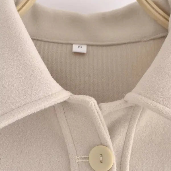 Beige collared jacket button detail from Autumn Winter Woolen Short Coat collection