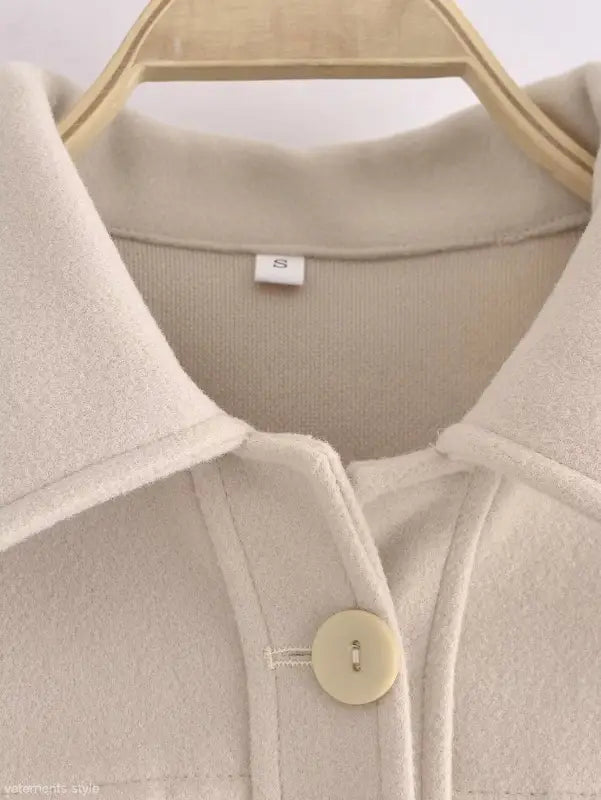 Beige collared jacket button detail from Autumn Winter Woolen Short Coat collection