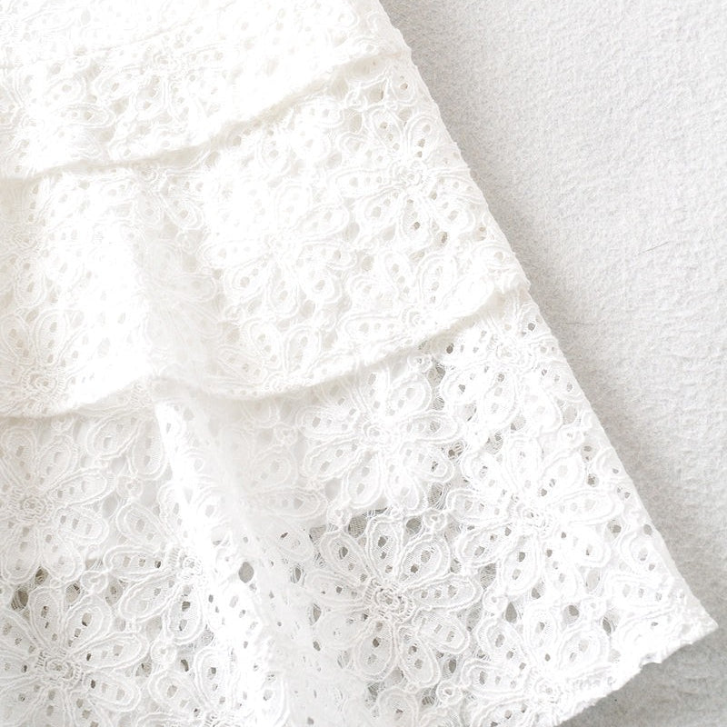 White lace tiered fabric of the elegant short lace up dress for sophisticated style