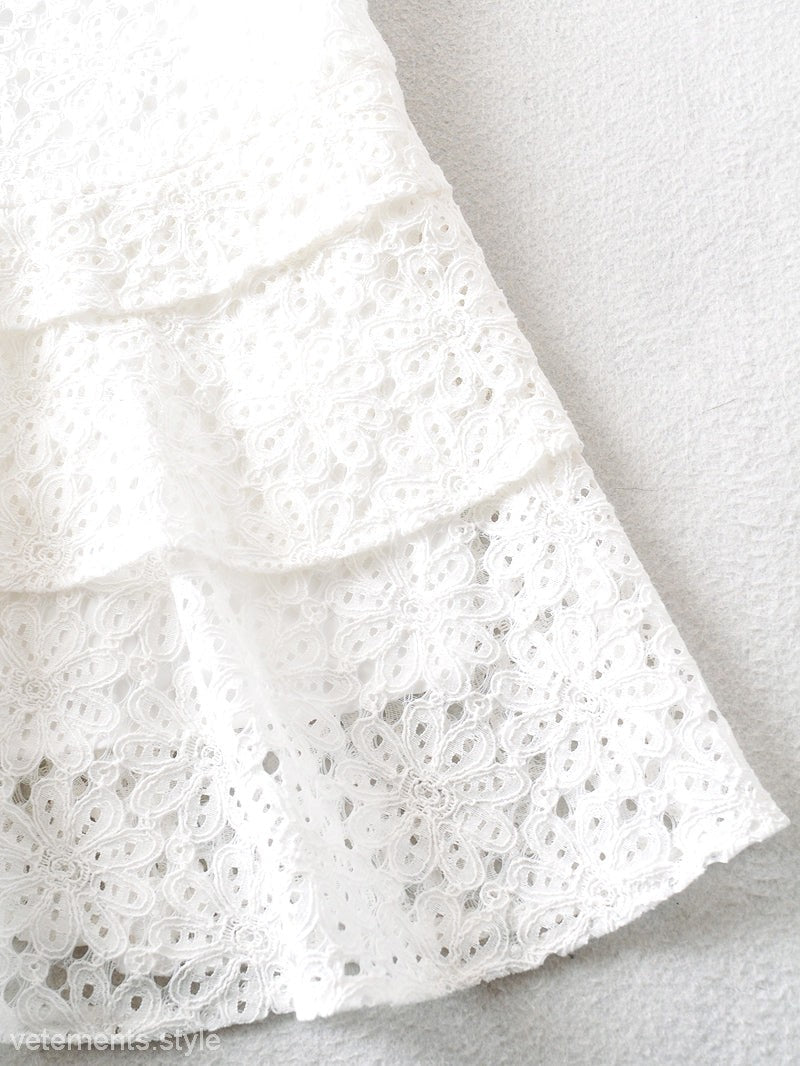 White lace tiered fabric of the elegant short lace up dress for sophisticated style