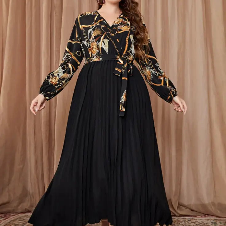 Long-sleeved chain-patterned top with pleated black skirt for a beautiful evening dress