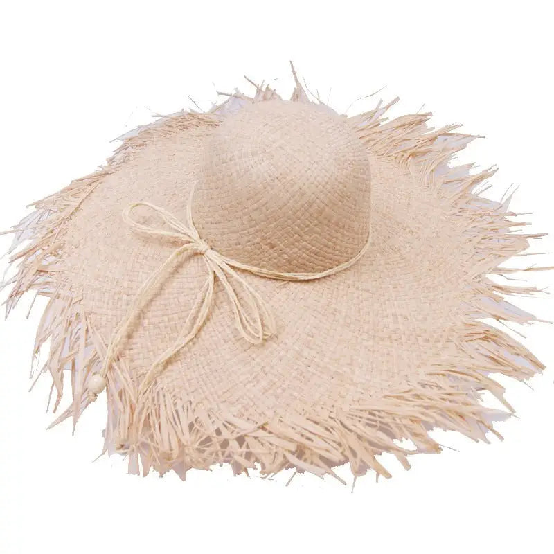 Frayed straw sun hat with ribbon bow, a stylish wide-brim sun hat with decoration rose red