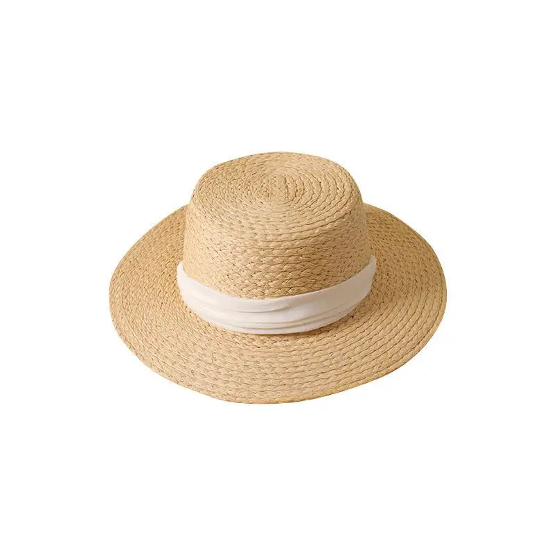 Beige wide-brim sun hat with white ribbon band for stylish sun protection