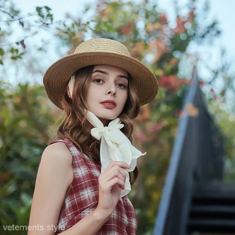 Beige wide-brim sun hat with ribbon band and neck scarf for stylish sun protection