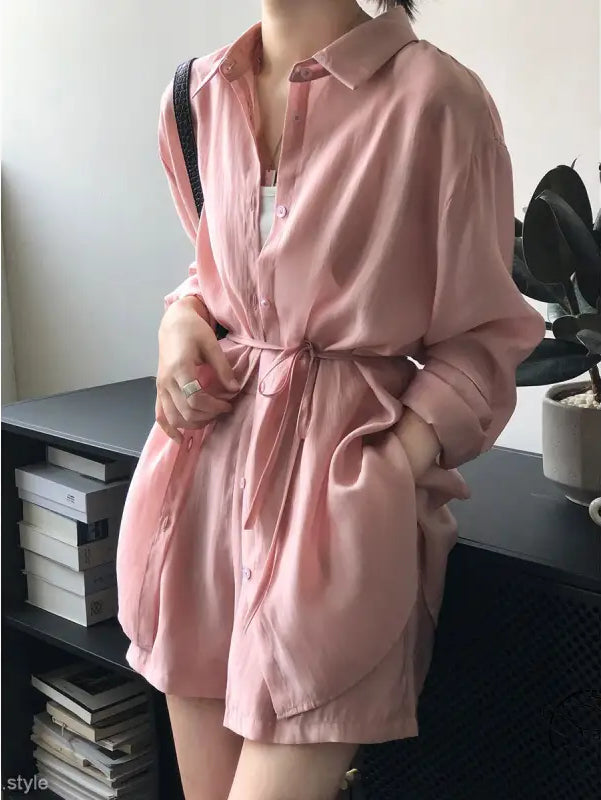Pink oversized button-down sun protection shirt with waist tie
