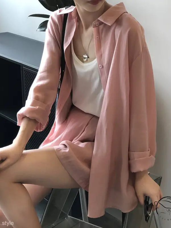 Pink belted sun protection shirt suit with shorts and top