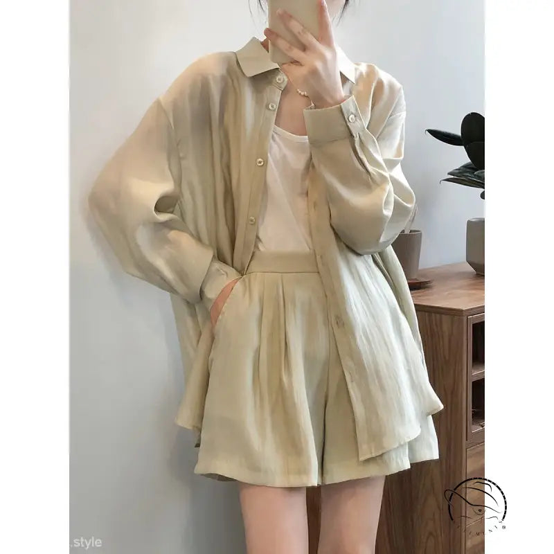 Breathable sun protection shirt suit with cream button-up and pleated shorts