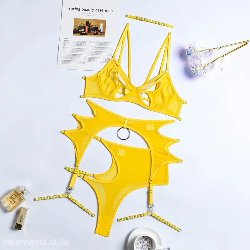Bright yellow cutout swimsuit with strappy details from a sexy lace five piece set