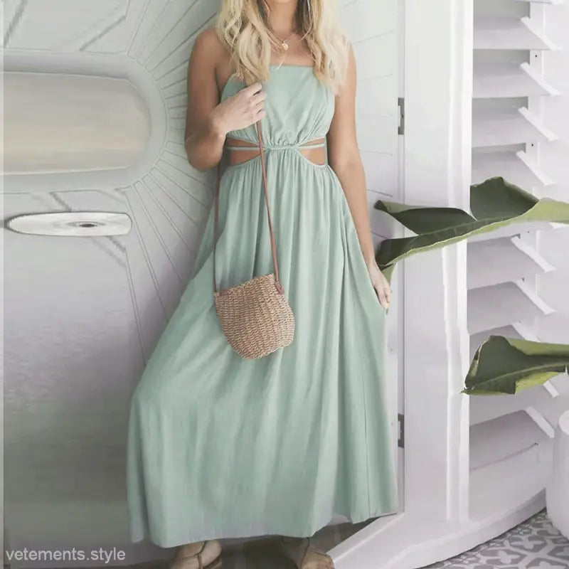 Mint green cami dress with cutout sides, perfect for summer vacations and fashion