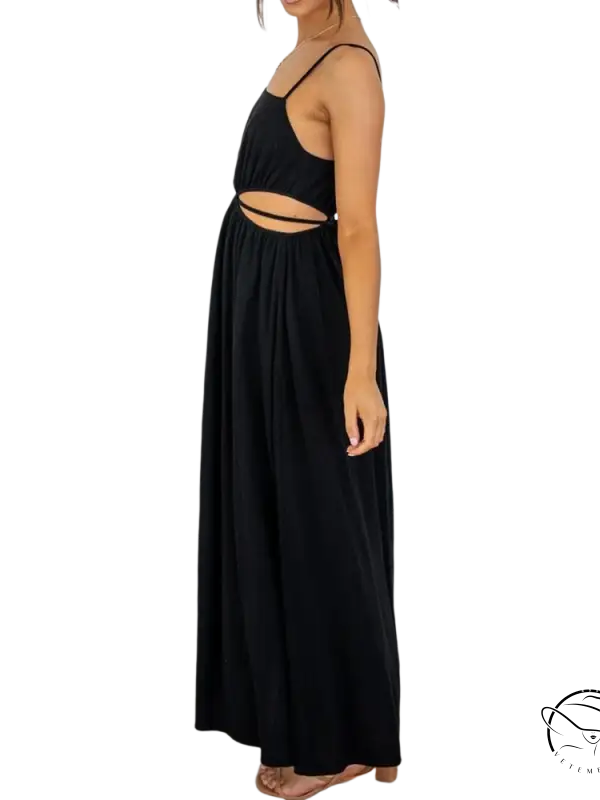 Black cami dress with spaghetti straps and waist cutout detail