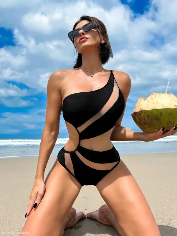 Boho Color Block Cutout Piece Swimsuit with one-shoulder black design and sheer mesh panels, available with free shipping from Langry