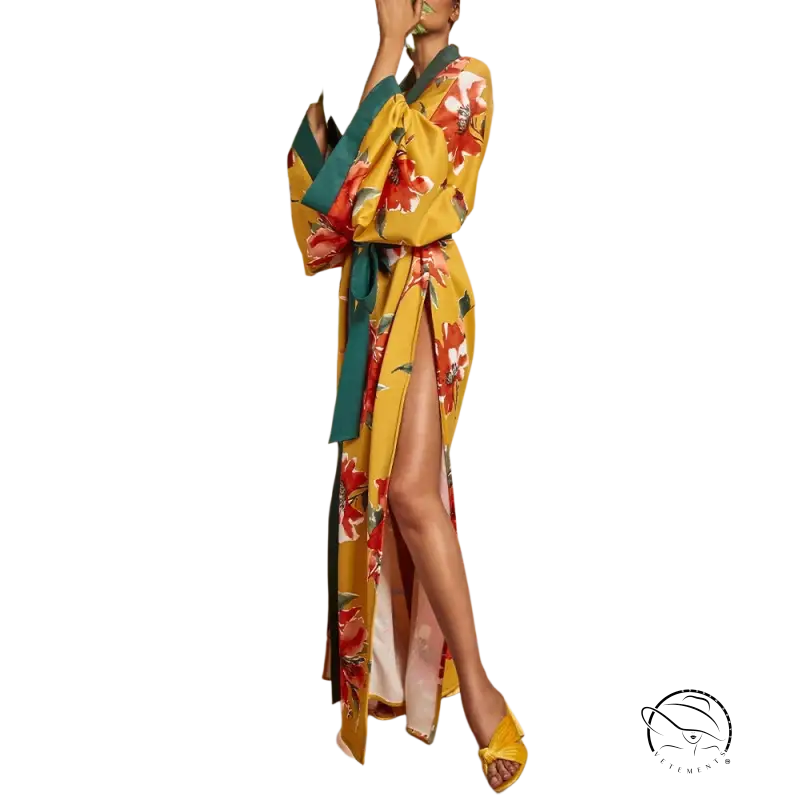 Vibrant yellow floral kimono trench coat with long sleeves, red and green accents