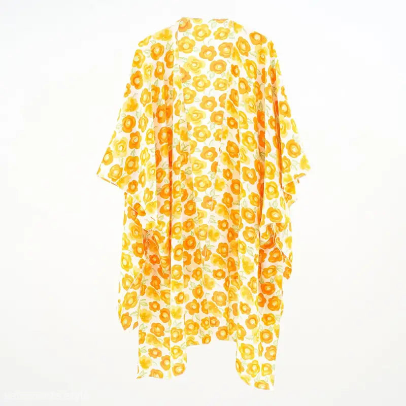 Yellow and orange floral patterned kimono-style robe for fresh sun protection and stylish sleeve length