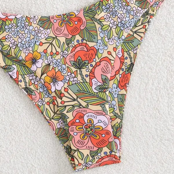 Vibrant floral-patterned bikini bottom with sexy push design, perfect for summer, free shipping available