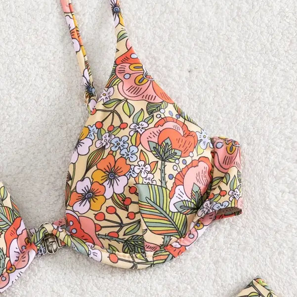 Sexy push floral print bikini top with colorful retro flowers, ideal for summer style