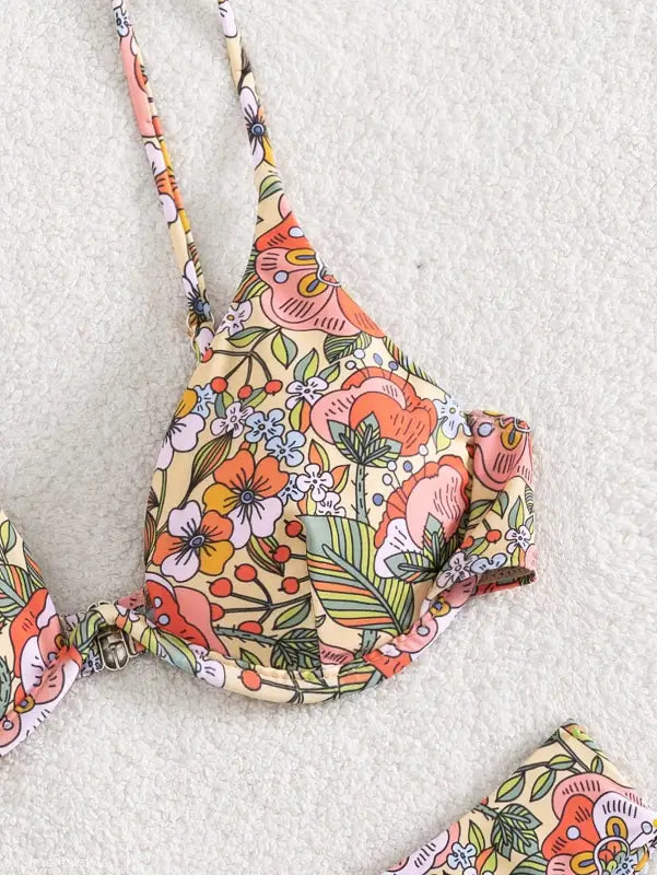 Sexy push floral print bikini top with colorful retro flowers, ideal for summer style