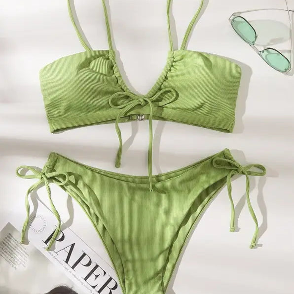 Light green ribbed high waist bikini swimsuit with tie details, perfect for beachwear