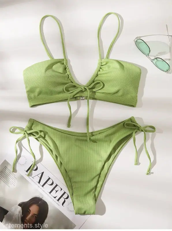 Light green ribbed high waist bikini swimsuit with tie details, perfect for beachwear