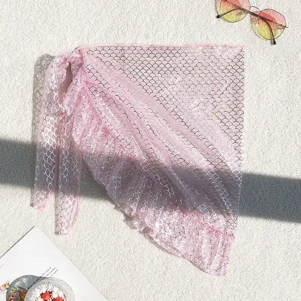 Delicate pink lace shawl complements the Boho Mesh Scale Skirt for sweet summer style