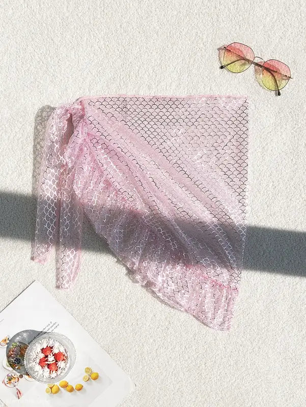 Delicate pink lace shawl complements the Boho Mesh Scale Skirt for sweet summer style
