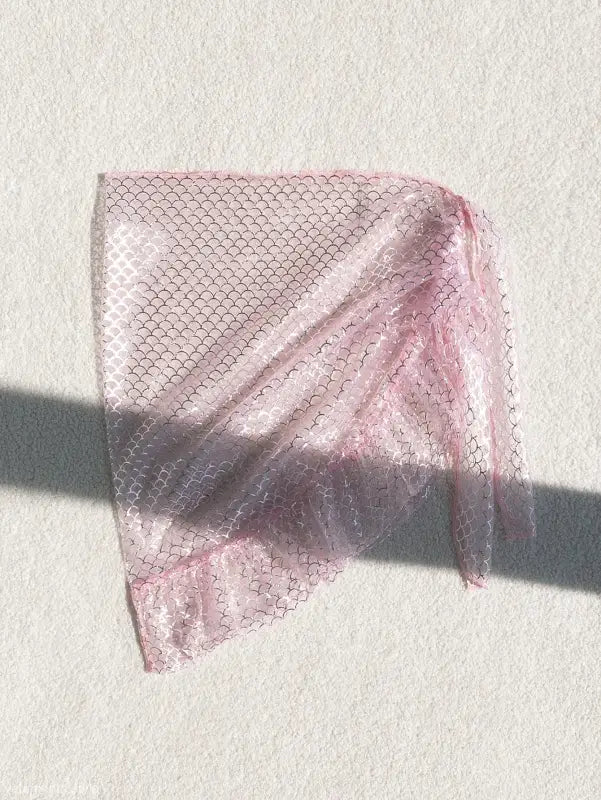 Delicate pink lace mesh fabric featuring scalloped pattern for Boho Mesh Scale Skirt