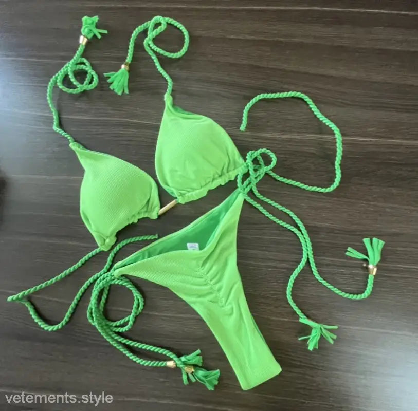 Bright green rope swimsuit bikini featuring braided ties and tassels for a trendy look